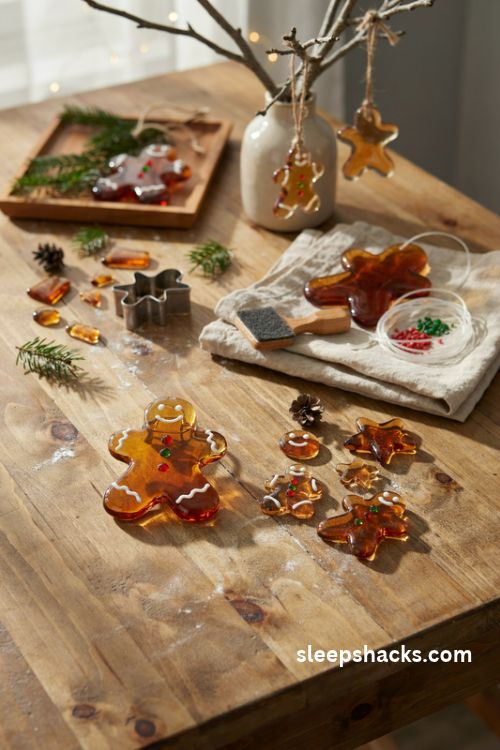 Fused glass gingerbread man christmas ornament with white icing and festive buttons
