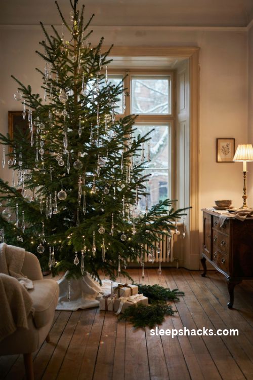 Glamorous Christmas tree with cascading crystal chandelier drops and warm white lights