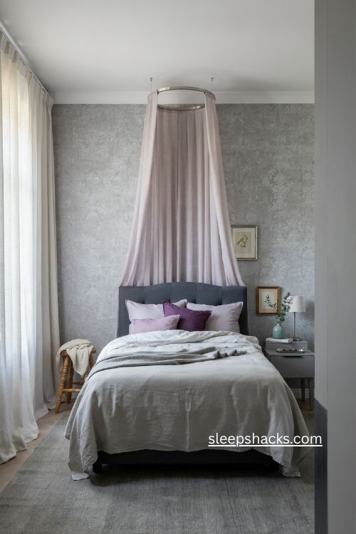 Gray and lilac bedroom with silver wallpaper soft canopy and charcoal headboard