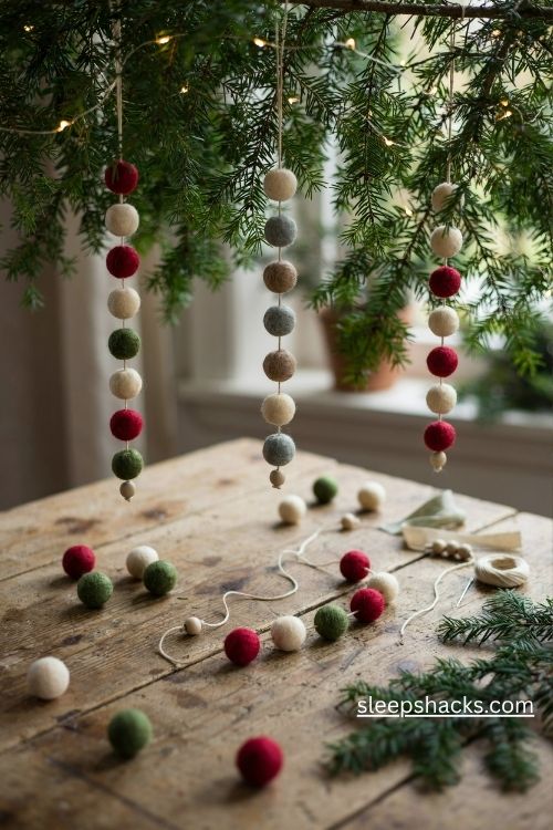 Handmade felt ball christmas ornaments with colorful wool beads wooden accents and cozy hanging strands