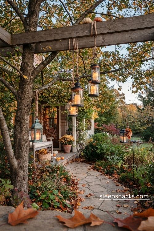 Hanging outdoor lanterns with warm led candles for a cozy fall porch and garden path 