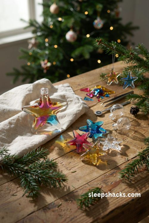 Iridescent dichroic glass star christmas ornaments in gold magenta and blue