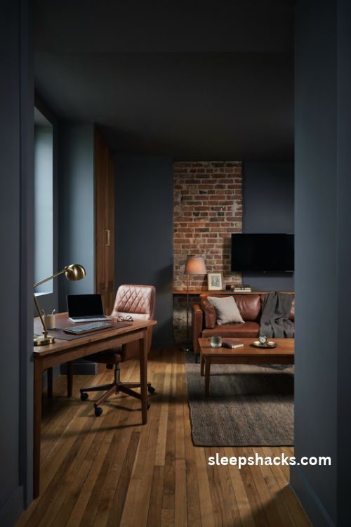 Man cave office with a leather sofa lounge zone wall mounted tv and cozy walnut furniture