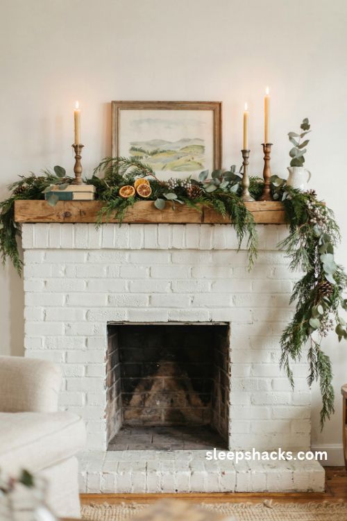Modern farmhouse Christmas mantel with layered cedar pine eucalyptus greenery garland