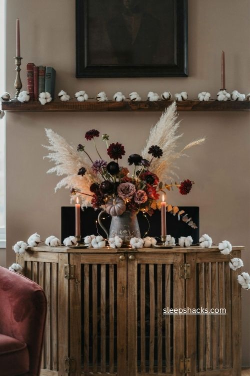 Moody plum florals with purple pumpkins and pink pampas grass 