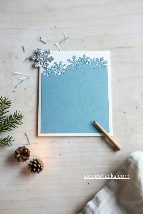 Off the edge snowflake die cut Christmas card with white border
