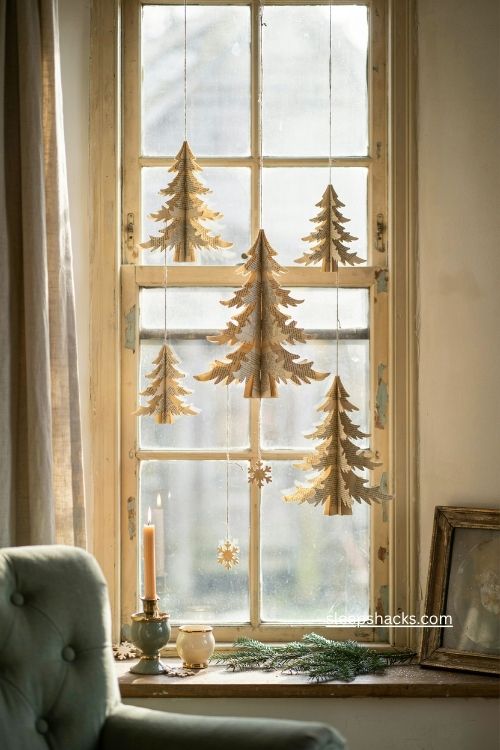Paper snowflake christmas tree decorations made from vintage book pages