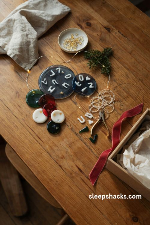 Personalized fused glass christmas ornament with white lettering on navy glass