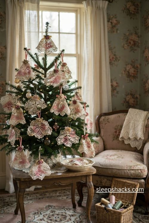 Pink lace doily christmas ornaments with tiny silk roses and pearl details on a vintage tabletop tree