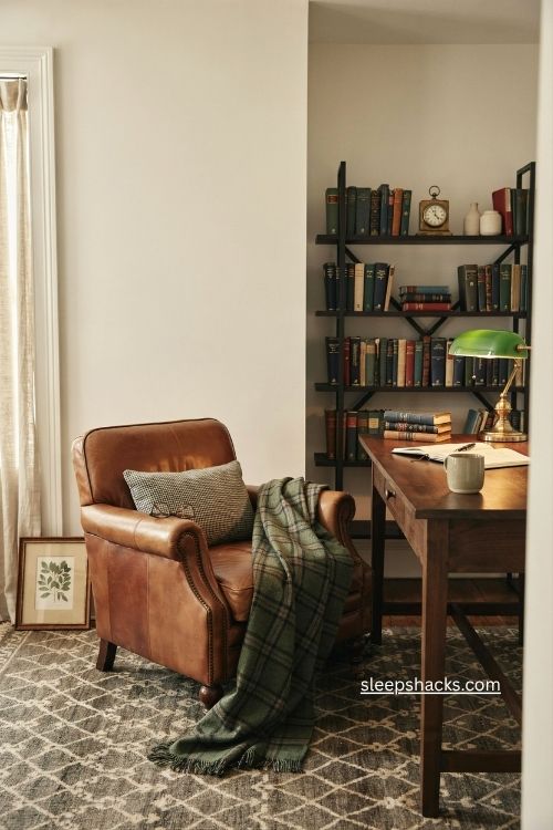 Plaid and houndstooth textiles in a cozy masculine home office