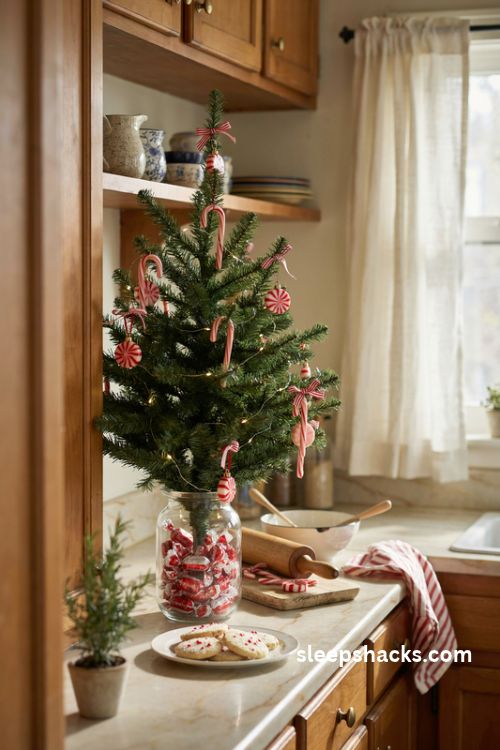 Red and white candy cane Christmas tree with peppermint ornaments in a cozy farmhouse kitchen