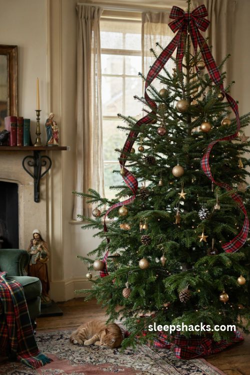 Royal Stewart tartan ribbon Christmas tree with gold ornaments and warm white lights