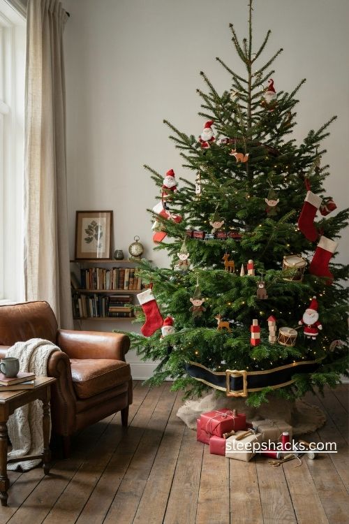 Santa's workshop christmas tree with wooden toys red stockings and gold belt ribbon