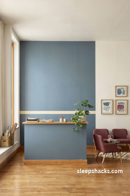 School colors accent wall behind the reception desk in a warm and welcoming school office
