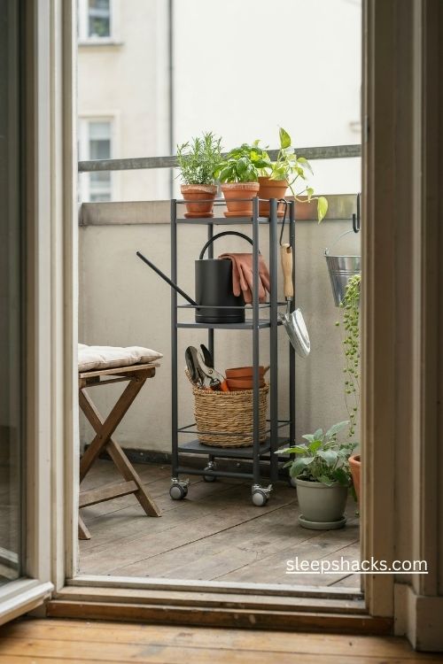 Slim rolling cart ideas for small balcony storage with three tier metal shelves and plants 