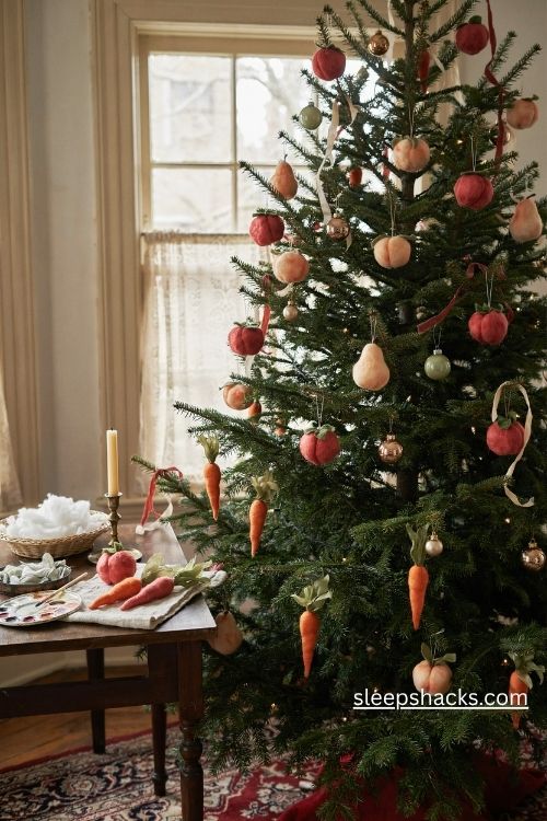 Spun cotton fruit and vegetable Christmas ornaments with handmade strawberries peaches pears and silk leaves on a vintage Victorian tree
