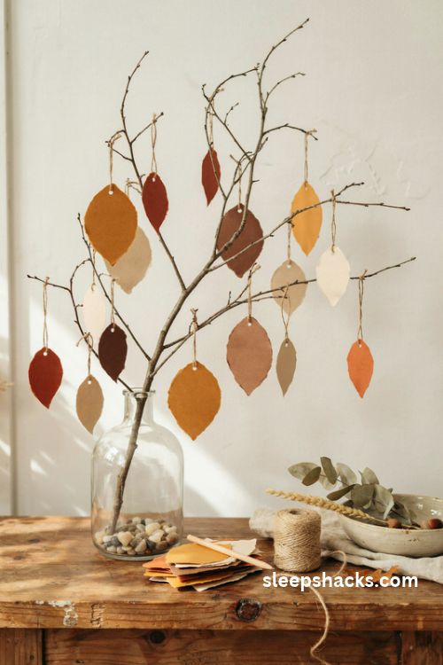 Thanksgiving gratitude tree with blank autumn paper leaves twine and a rustic vase on a cozy farmhouse entry table