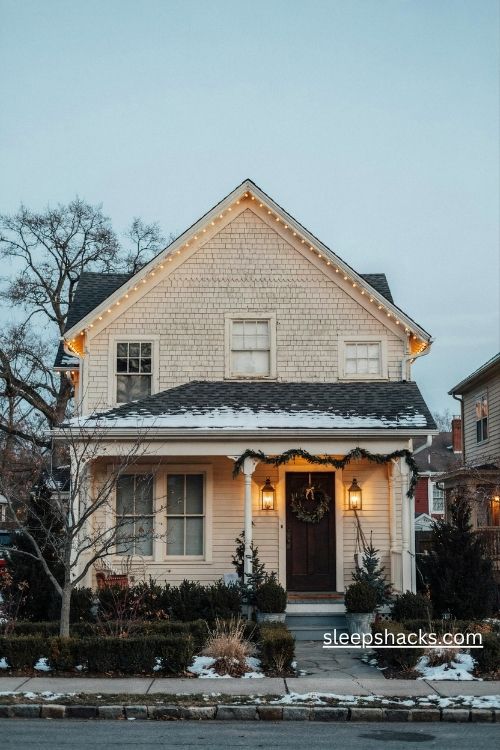 Warm white roofline christmas lights on a charming home exterior at dusk