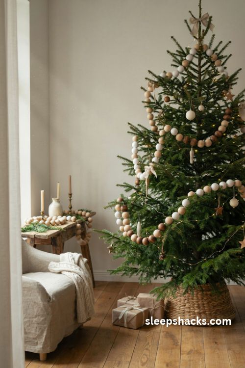 Wooden bead garland Christmas tree with natural wood tones and rustic farmhouse decor