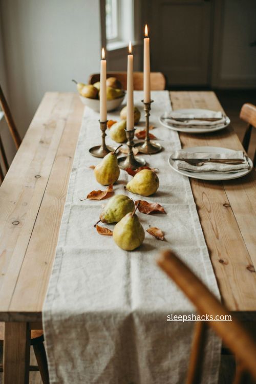 pears autumn leaves and brass taper candles simple fall table centerpiece 
